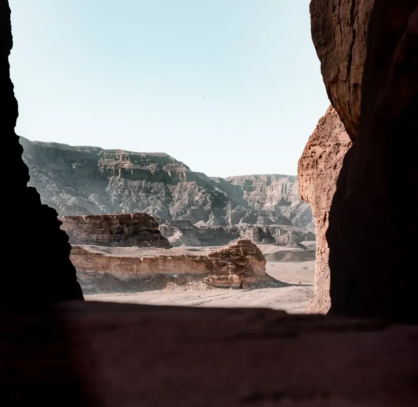 beautiful-view-rocks-cliff-desert-captured-from-inside-cave